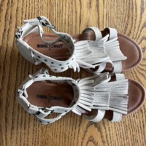 Minnetonka Taupe Fringe Wedge Sandal